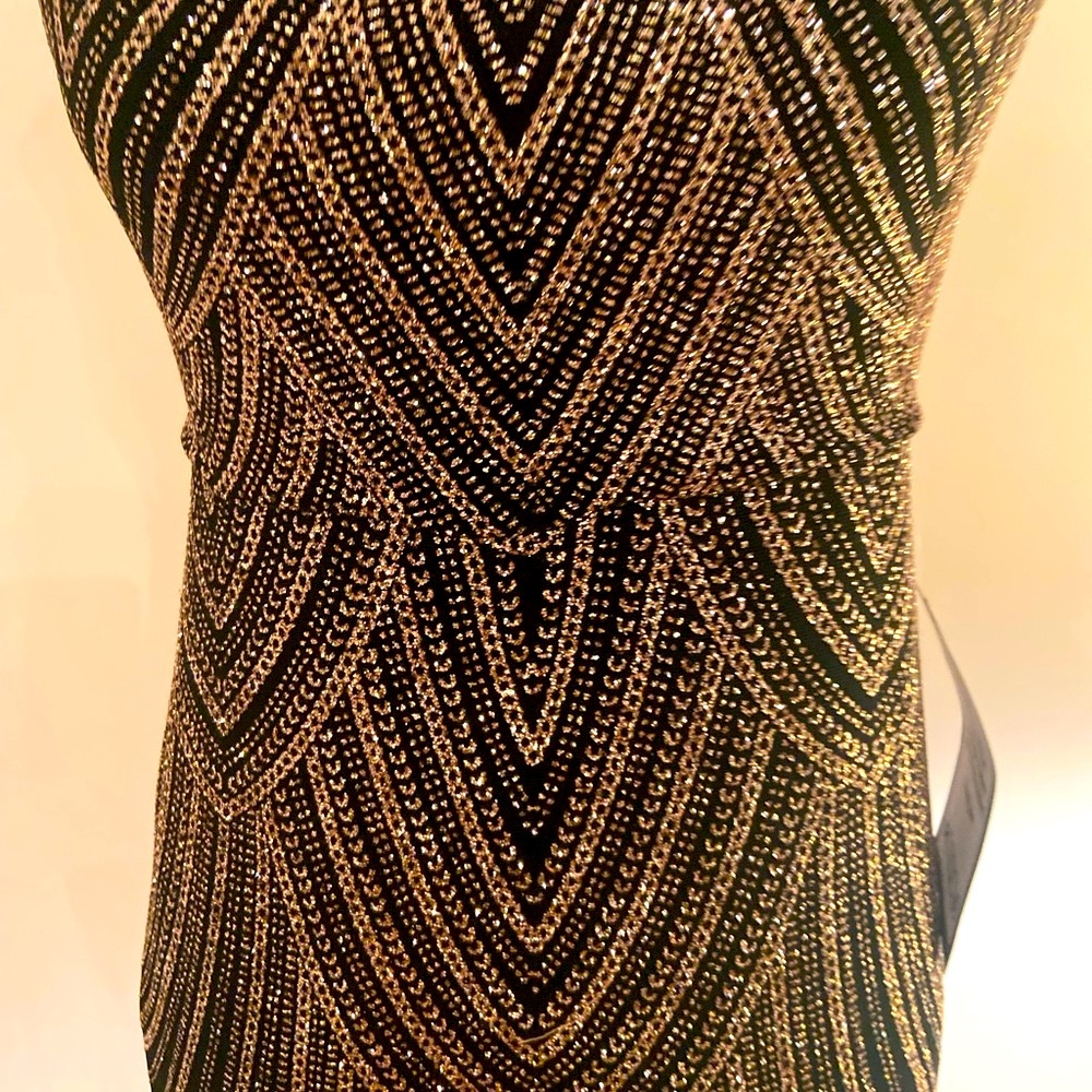 Super flattering evening gown by Betsy & Adam size 4